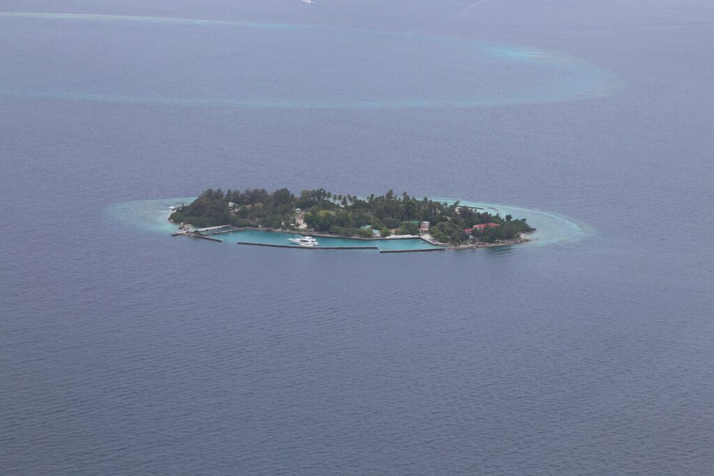 A small reef island in North Malé Atoll seen from the air